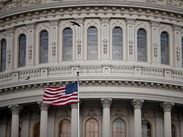 Stocks, dollar fall on Senate tax plan concerns 