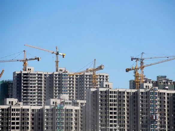 China may be headed for rare property defaults, Neuberger says