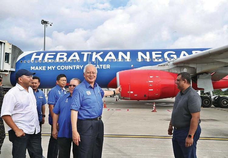 Blame all around as Najib arrested, charged