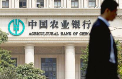 Tens of thousands of jobs go as China’s biggest banks cut costs