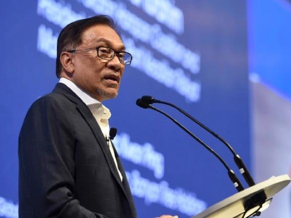 Anwar to focus on parliament reforms if elected; sanguine on Singapore relations
