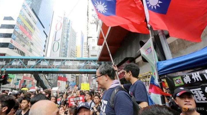 Many in Hong Kong, fearful of China's grasp, flee to Taiwan