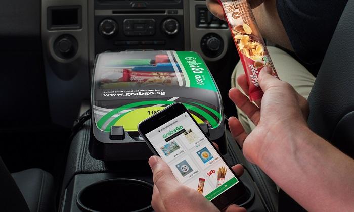 Grab commuters can now shop and collect freebies with a new in-car service, Grab&Go 