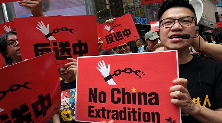 Hong Kong pushes bill allowing extraditions to China despite biggest protest since handover