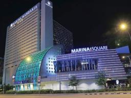 Singapore economy seen softening; UOL, UIC gain on Marina Square deal