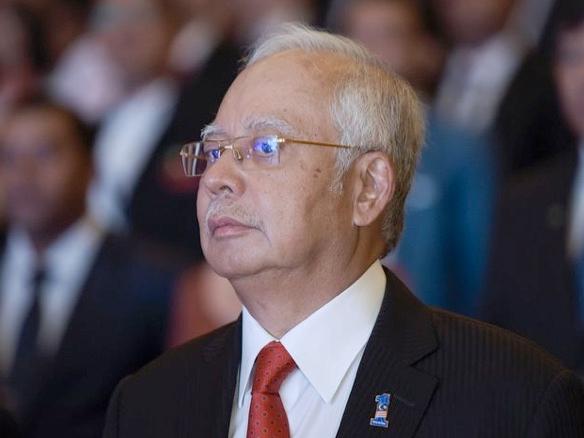 Najib looking at 21 charges in third arrest this year