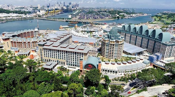Tourists surging to Singapore help push hotel deals to record