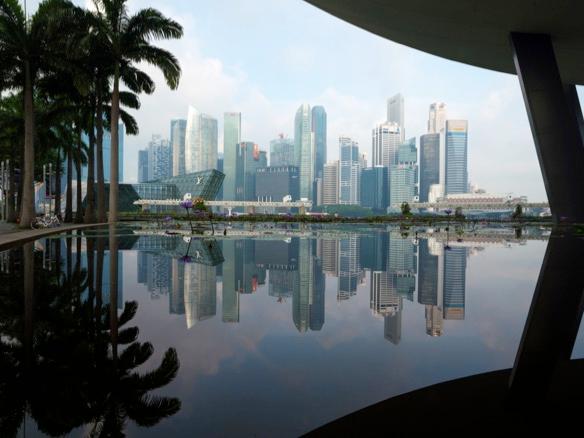 Trade protectionism, China economy seen as increasingly risky to Singapore's GDP growth