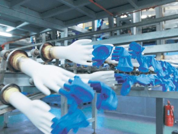 Top Glove downgraded by Maybank as acquisition hits a snag