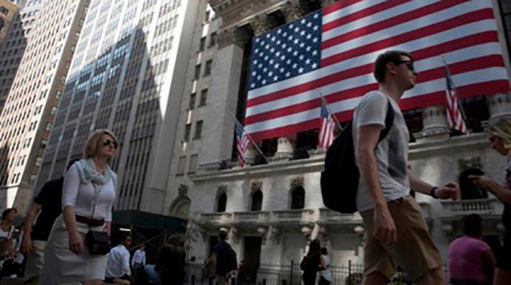 Fed officials worry about lasting economic scars from Covid-19, but Warren Buffet remains confident of the 'American Magic'