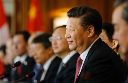 Xi, unlikely champion for business elites, takes Davos spotlight