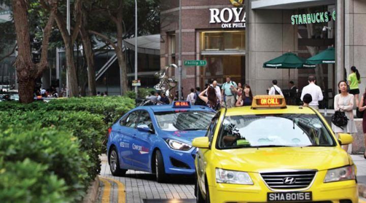 Taxi operator ComfortDelGro upgraded to 'buy' even as ride-hailing market thrives amid ‘healthy competition’