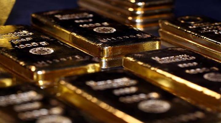 Gold's glimmer dims as investors bet on lockdown ease