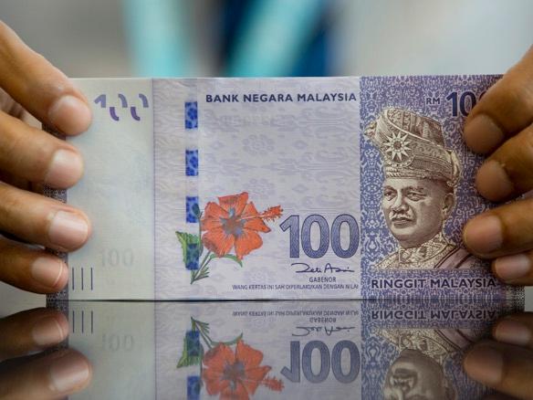 Malaysia central bank holds key rate as election shock spurs economy concerns