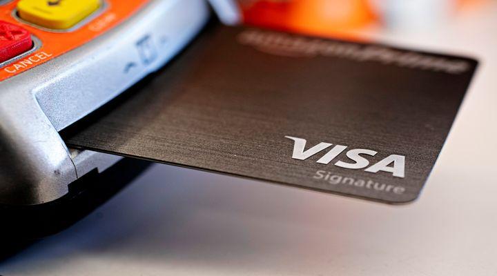 Visa joins Mastercard in cutting revenue outlook on virus impact