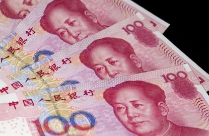 China's yuan down, state banks step in to temper fall